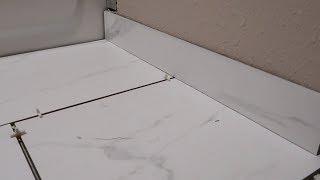 How To Install A Tile Bullnose Baseboard SIMPLE amp EASY [upl. by Wendie]